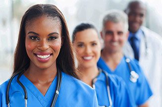 Group of happy healthcare workers line up
